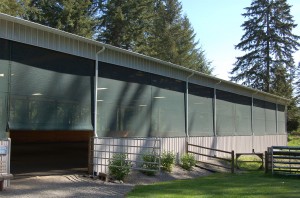 Arena with GaleShield Stationary Screen Kits. KEEPS OUT WIND, RAIN, SLEET, SNOW, and HOT-DRYING SUN
